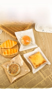 Macro view of transparent greaseproof food packaging bags showing high clarity and seal