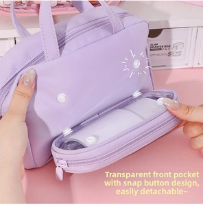 Detail of lavender pouch with a detachable clear PVC front pocket and snap buttons