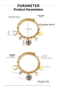 Detailed view of 18k gold plated stainless steel evil eye charm bracelet with dimensions