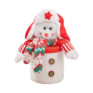 Christmas snowman gift bag with red star hat and green buttons on white background