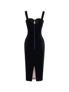 Detailed back view of a slim velvet dress featuring a stylish slit and elegant texture