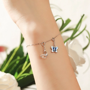 Exquisite S925 silver hollow butterfly pendant bracelet with enamel and zircon details