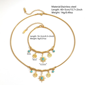Golden stainless steel jewelry set with sun and tree of life pendants and turquoise beads