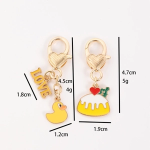 Zinc alloy enamel cartoon cat and yellow duck charms with heart-shaped lobster clasps