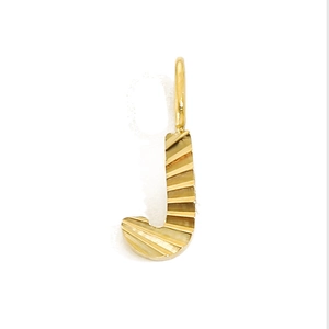 Macro view of gold-plated letter J pendant with textured horizontal stripes and ring