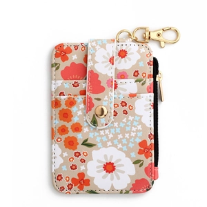 Floral print card holder wallet with gold keychain ring and secure zipper closure