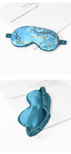 Detail view of Van Gogh Almond Blossom silk sleep mask with elastic strap and plain back side