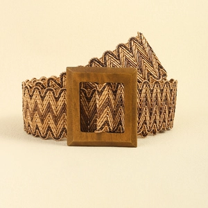 Detail of woven straw belt texture with a square wooden buckle for women's summer style