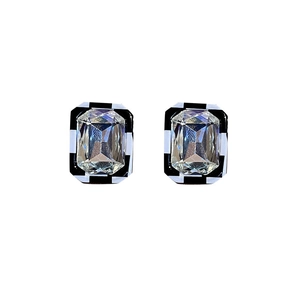 Square silver earrings with crystal center and black and white checkered border