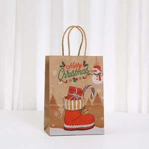 Christmas kraft paper gift bag with Merry Christmas snowman print and twisted handles