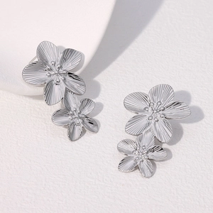 Elegant vintage silver double flower earrings with textured metallic finish and gold plating