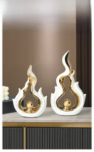 Modern abstract ceramic flame statues in white and gold finish for luxury home decor