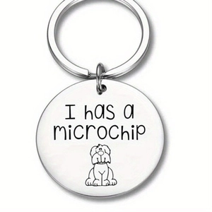 Stainless steel keychain with I have a microchip engraving and dog icon for pet owners