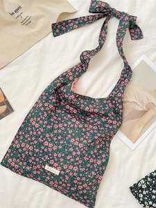 Floral canvas tote bag with bow straps and green pattern, stylish large shoulder bag