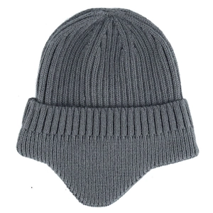 Close-up of gray knit beanie featuring warm fleece lining and ribbed texture detail