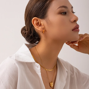 18K gold plated titanium steel hoop earrings with orange enamel and layered heart necklaces
