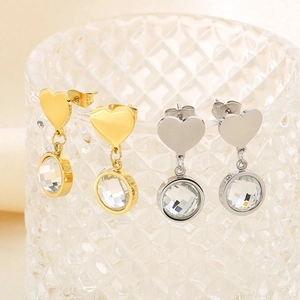 Minimalist heart earrings in gold and silver finish with faceted crystal pendants