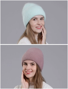 Detail of mint green and dusty purple knitted rabbit fur beanies with ribbed texture