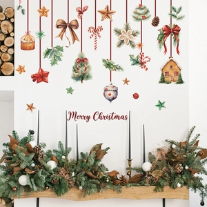 Merry Christmas wall stickers with pine branches, bows, and bells for holiday home decor