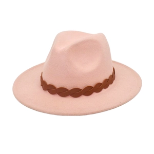 Detail of light pink fedora hat with a brown woven decorative band and wide flat brim
