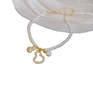 Bracelet en perles de style français avec pendentif gourde en zircon doré et charme élégant