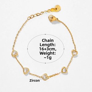 Detail of adjustable gold bracelet with five heart-shaped zircons and lobster clasp