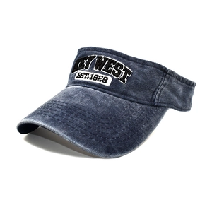 Navy blue washed denim visor hat with Key West embroidery in a 45-degree angle view
