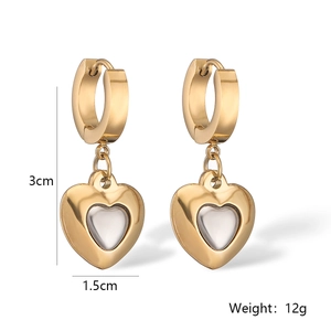 Detailed view of gold-plated heart drop earrings with white inlay and size dimensions