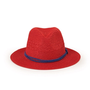 Detailed view of a red woven fedora hat with a contrasting dark blue decorative rope band