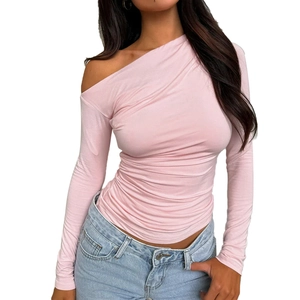 Detail of pink off-shoulder long sleeve top with ruched texture and slim fit design