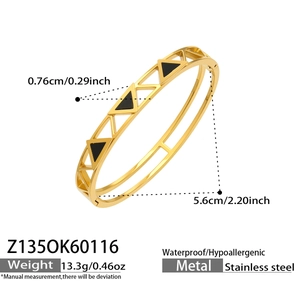 Detail showing 18k gold plated stainless steel bracelet with black triangle geometric inlays