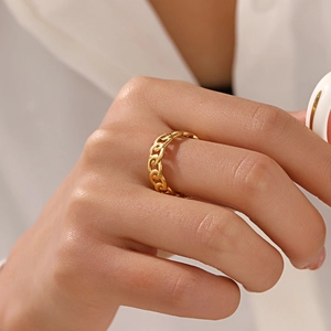 Gold plated stainless steel chain link adjustable ring shown on a hand model