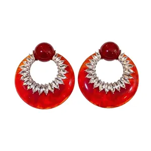 Vintage red marble resin hoop earrings with rhinestone accents and silver needle studs
