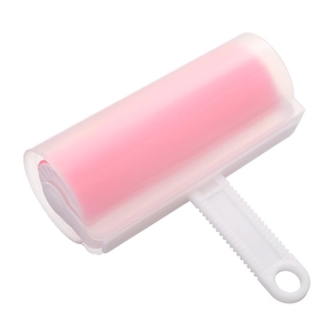 Abwaschbarer Fusselroller in Rosa für Kleidung mit weißem Griff und Staubschutzdeckel