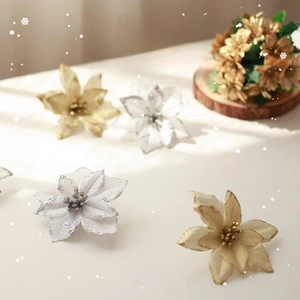 Glitter poinsettia artificial Christmas flowers in gold and silver for holiday decor