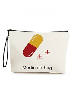 Detail of a white canvas medicine bag with printed pill icons and black metal zipper