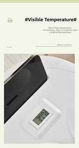 Detail view of the digital LCD display showing real-time temperature on a white foot bath bucket