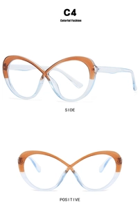Detail of cross-frame orange and blue butterfly glasses showing side and front view