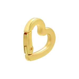 Macro detail of heart-shaped 18K gold plated clasp connector for DIY jewelry making