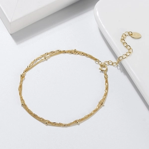 Polished S925 sterling silver beaded twist chain bracelet in golden finish for women