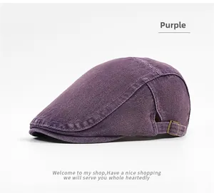 Detail view of purple washed cotton beret featuring an adjustable metal buckle strap