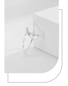Macro detail of S925 sterling silver moon ring featuring star-shaped cubic zirconia stones