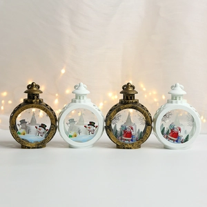 Vintage Christmas lanterns with LED candles and Santa Claus snowman festive designs