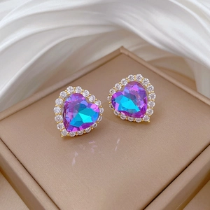 Titanium steel heart earrings with purple-blue crystals and small diamonds on white silk
