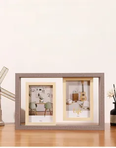 Detail of 4x6 multi-frame wooden photo display with grey and light oak textures