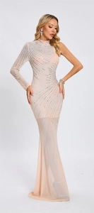 Detail of nude mesh evening dress featuring intricate silver rhinestone patterns and sequins