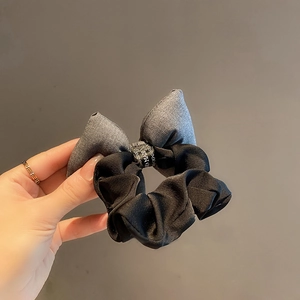 Elegant two-tone fabric bow scrunchie with diamond detail for women's hairstyles