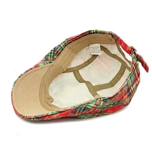 Classic plaid cotton beret hat with beige interior lining and sweatband detail