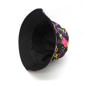 Detail showing the reversible design with black inner side and colorful graffiti print