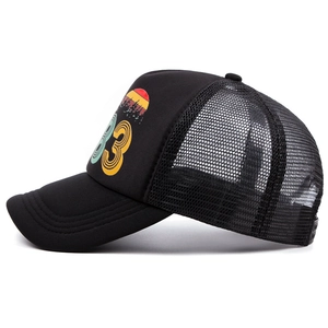 Detail of vintage 1983 print and breathable mesh on a black American style trucker hat
